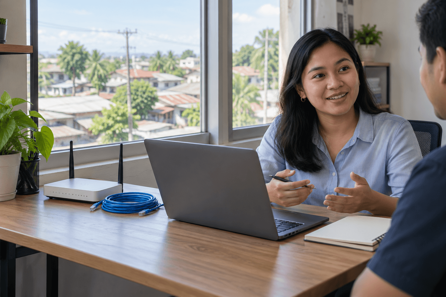 An internet provider owner and colleague in a neighborhood office